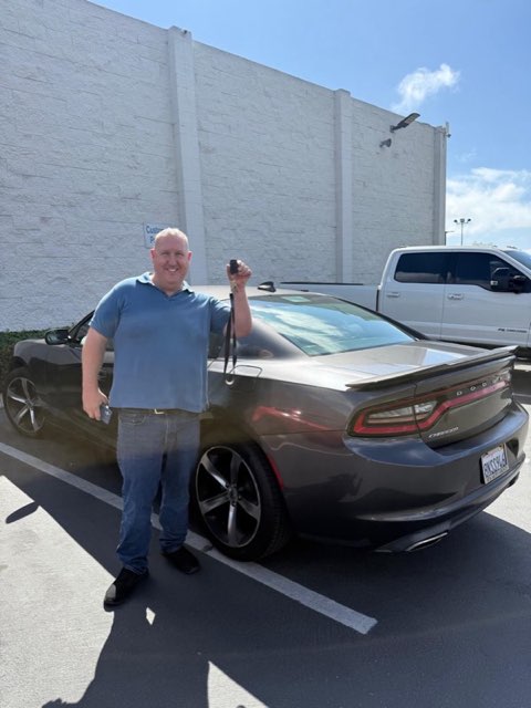 Inside Car Guys customer with their new car