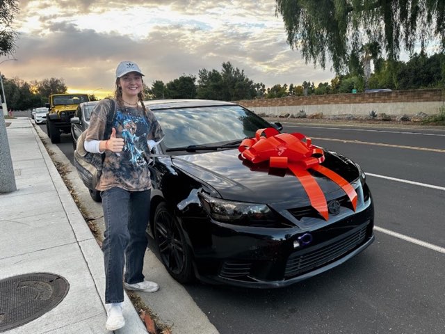 Inside Car Guys customer with their new car