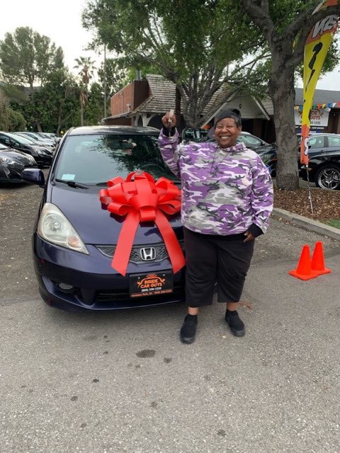 Inside Car Guys customer with their new car