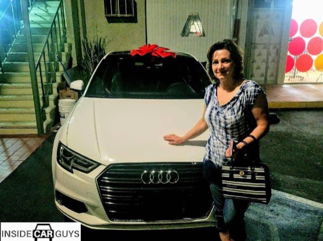 Inside Car Guys customer with their new car